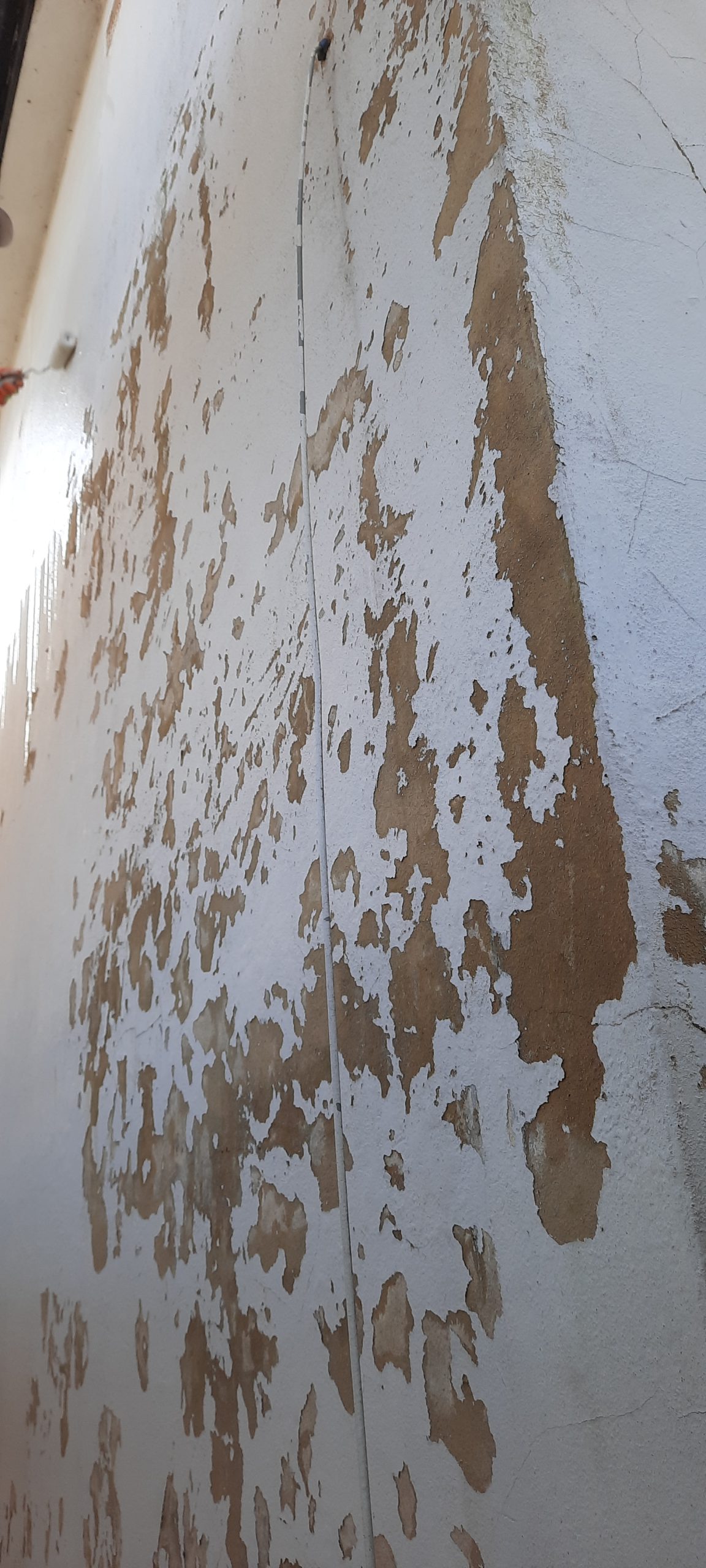 solid wall insulation Edinburgh on wall with stripped paint
