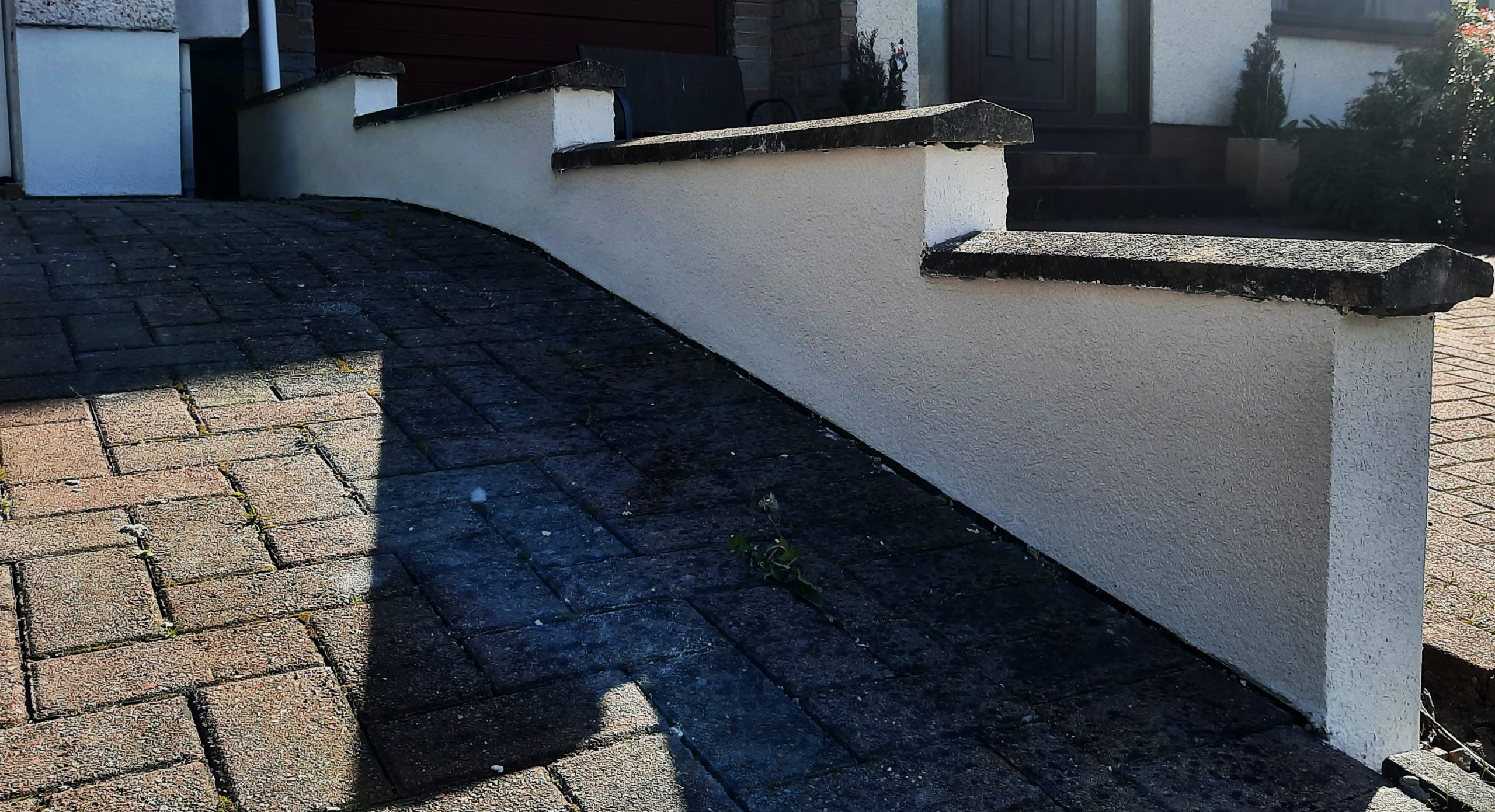 solid wall insulation Edinburgh along stepped garden wall