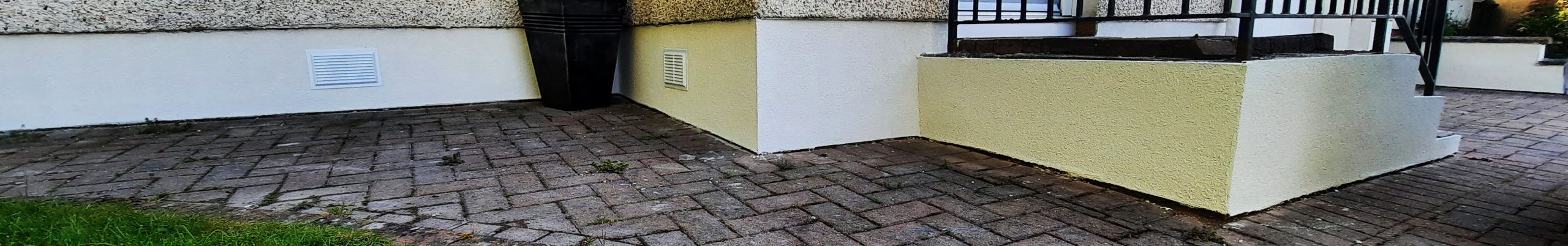 Insulation Edinburgh at base of freshly painted wall