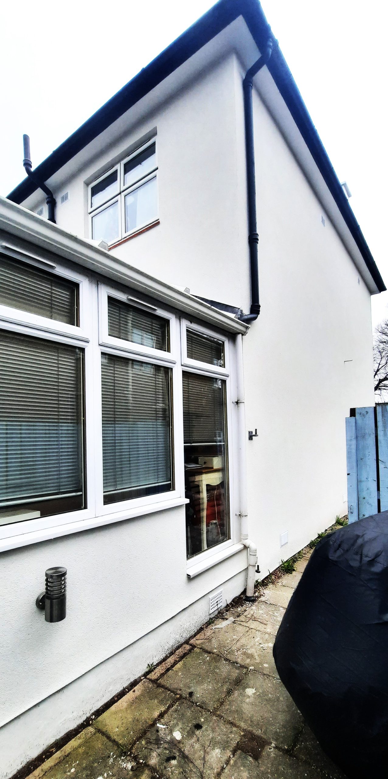 Insulation Edinburgh beneath white render around side windows