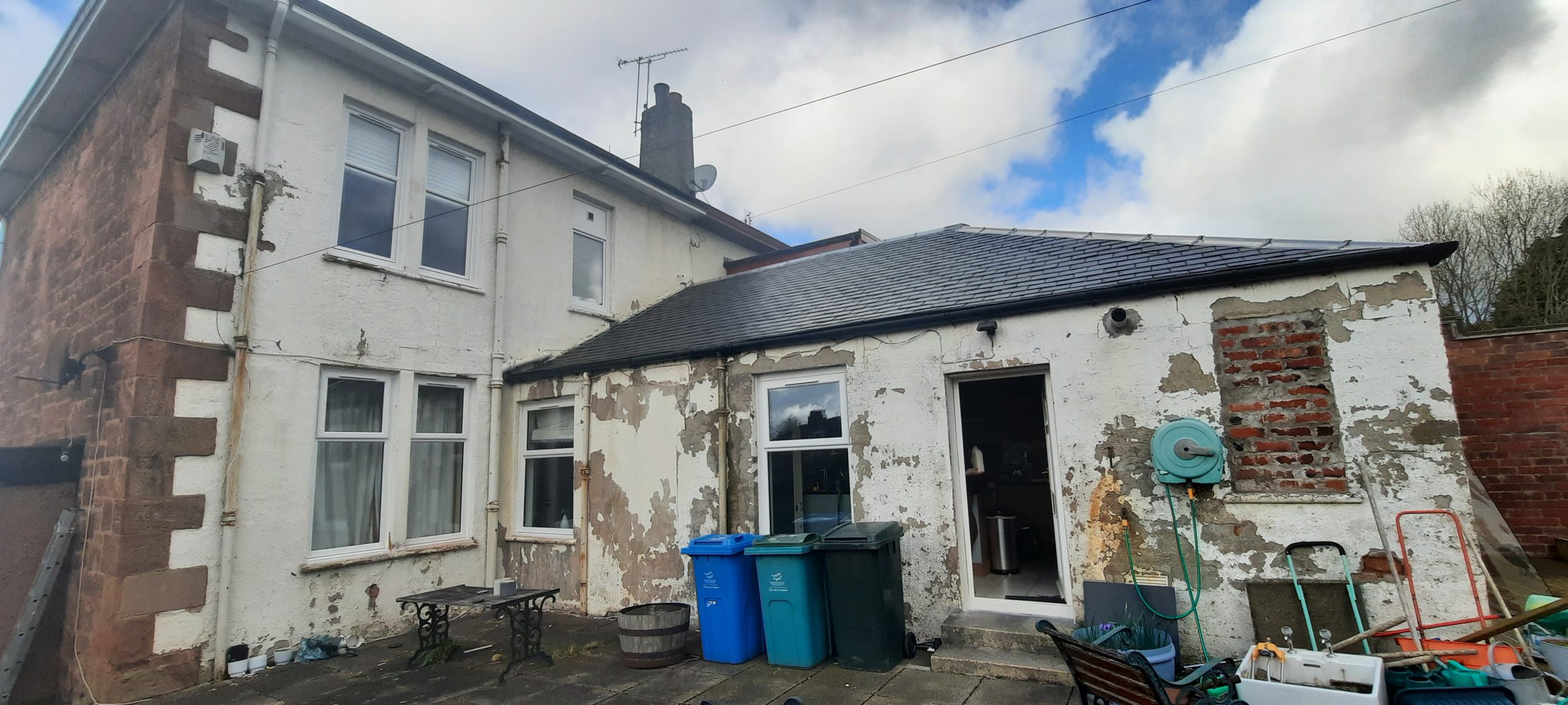 external wall insulation Edinburgh on damaged rear façade