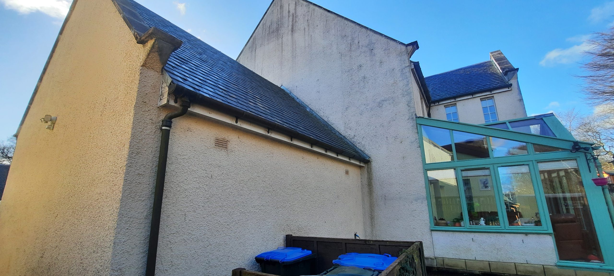 house rendering Edinburgh on upper floor with blue sky