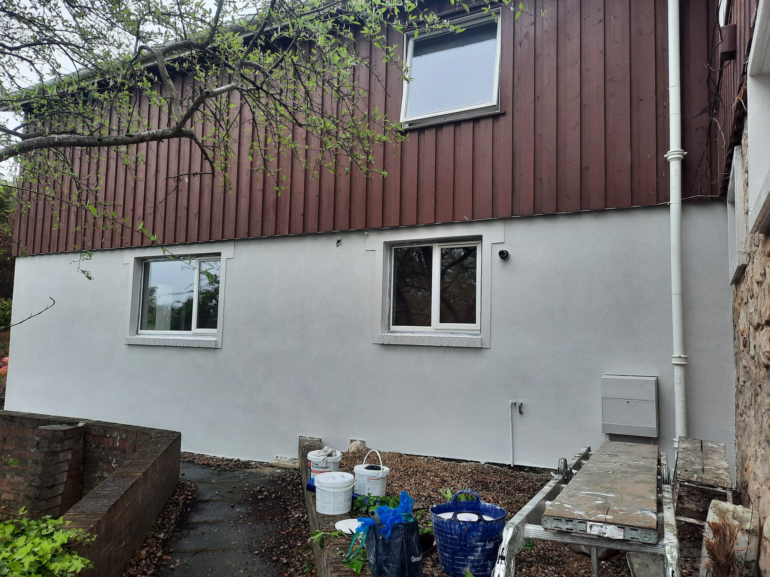 Rendering Edinburgh on side wall beneath wooden cladding
