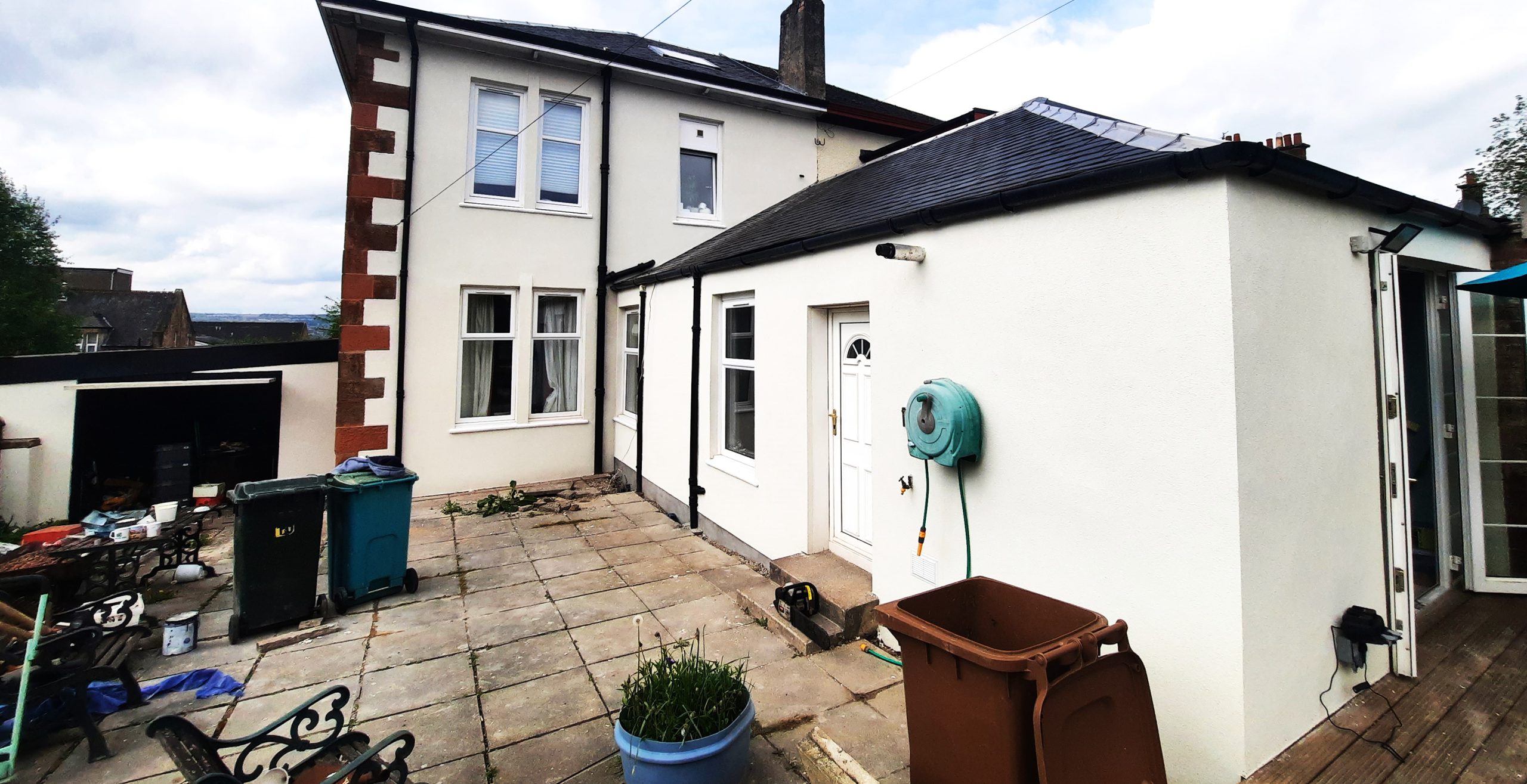 roughcasting Edinburgh on clean white rear extension wall