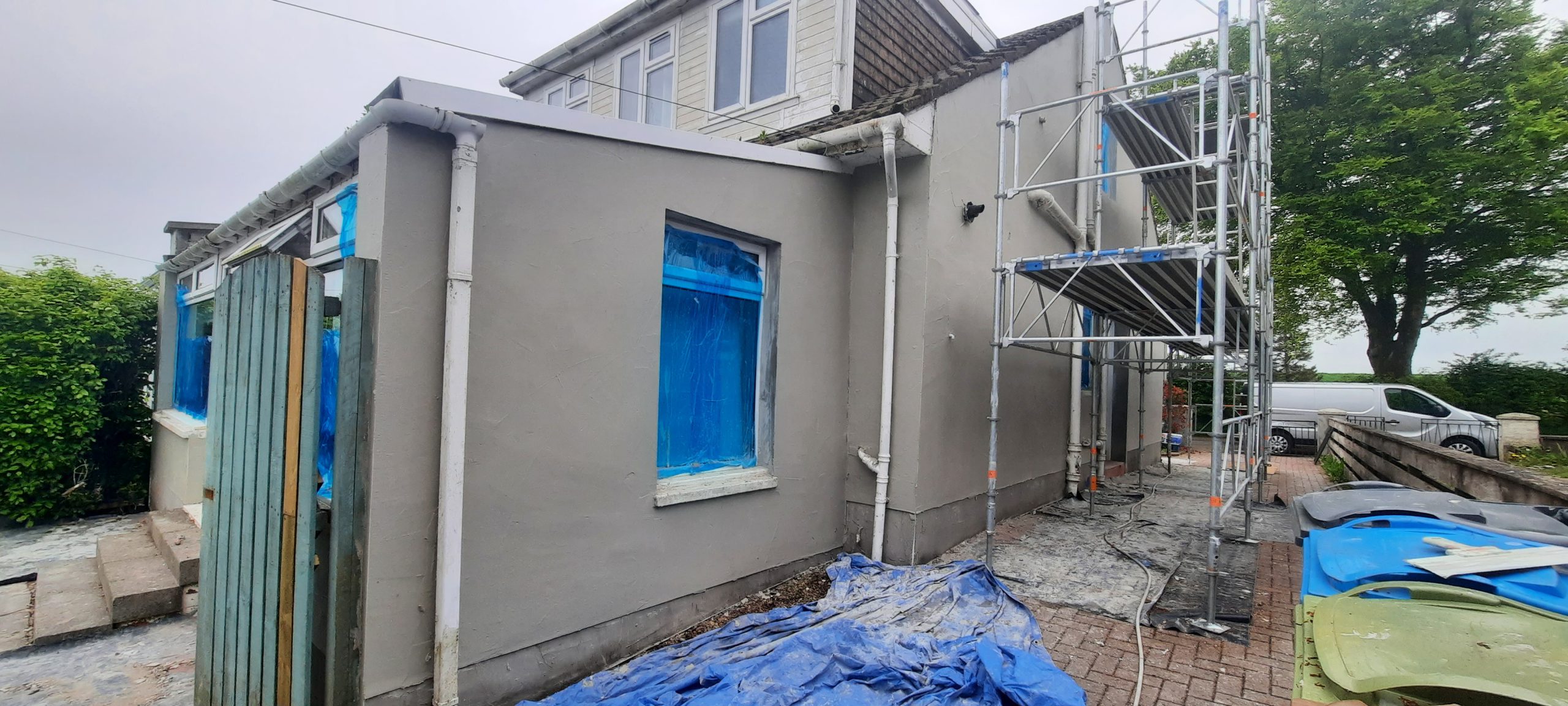 external wall insulation Edinburgh applied to rear wall with blue covers