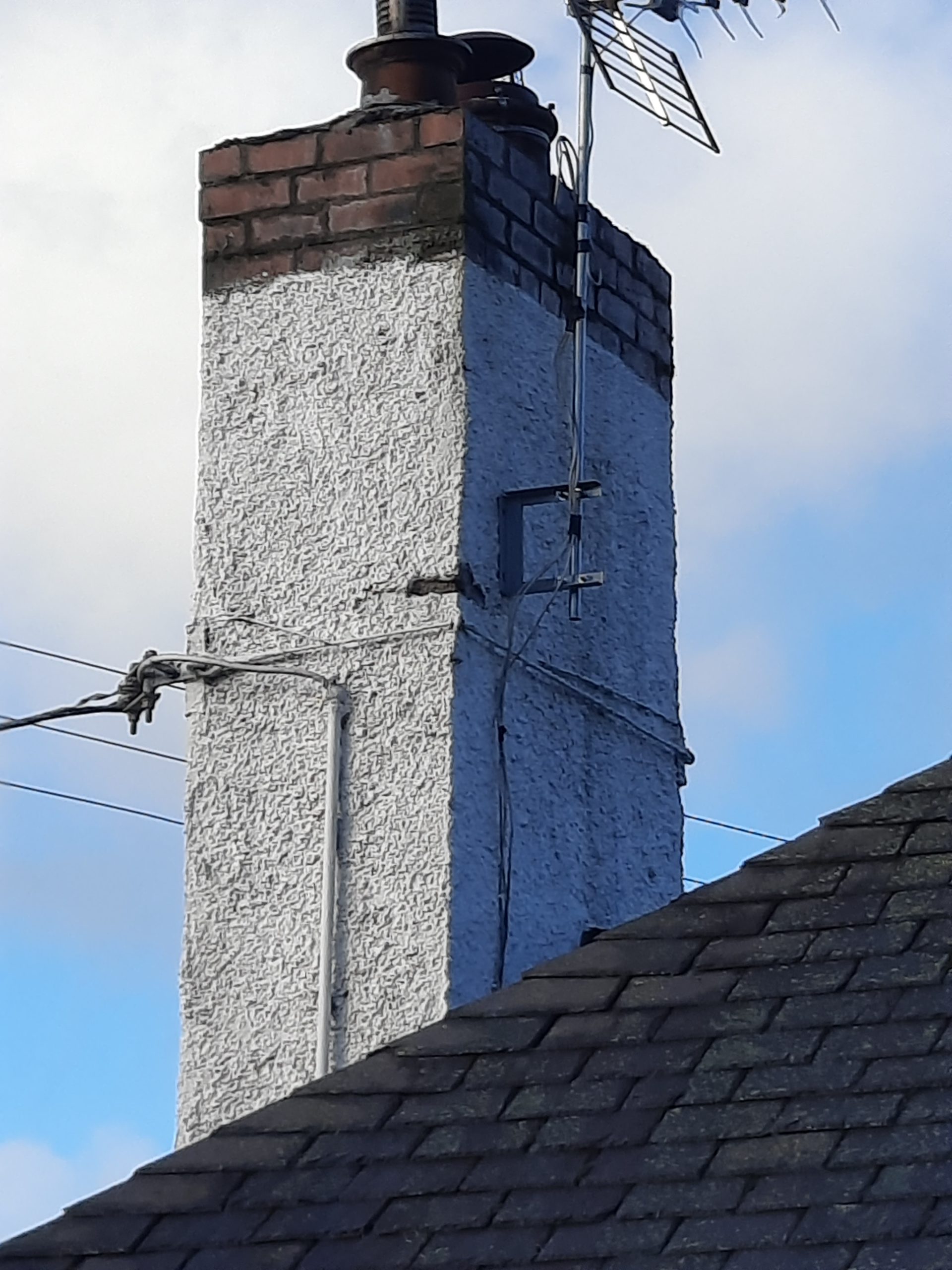 external wall insulation Edinburgh applied to tall roughcast chimney