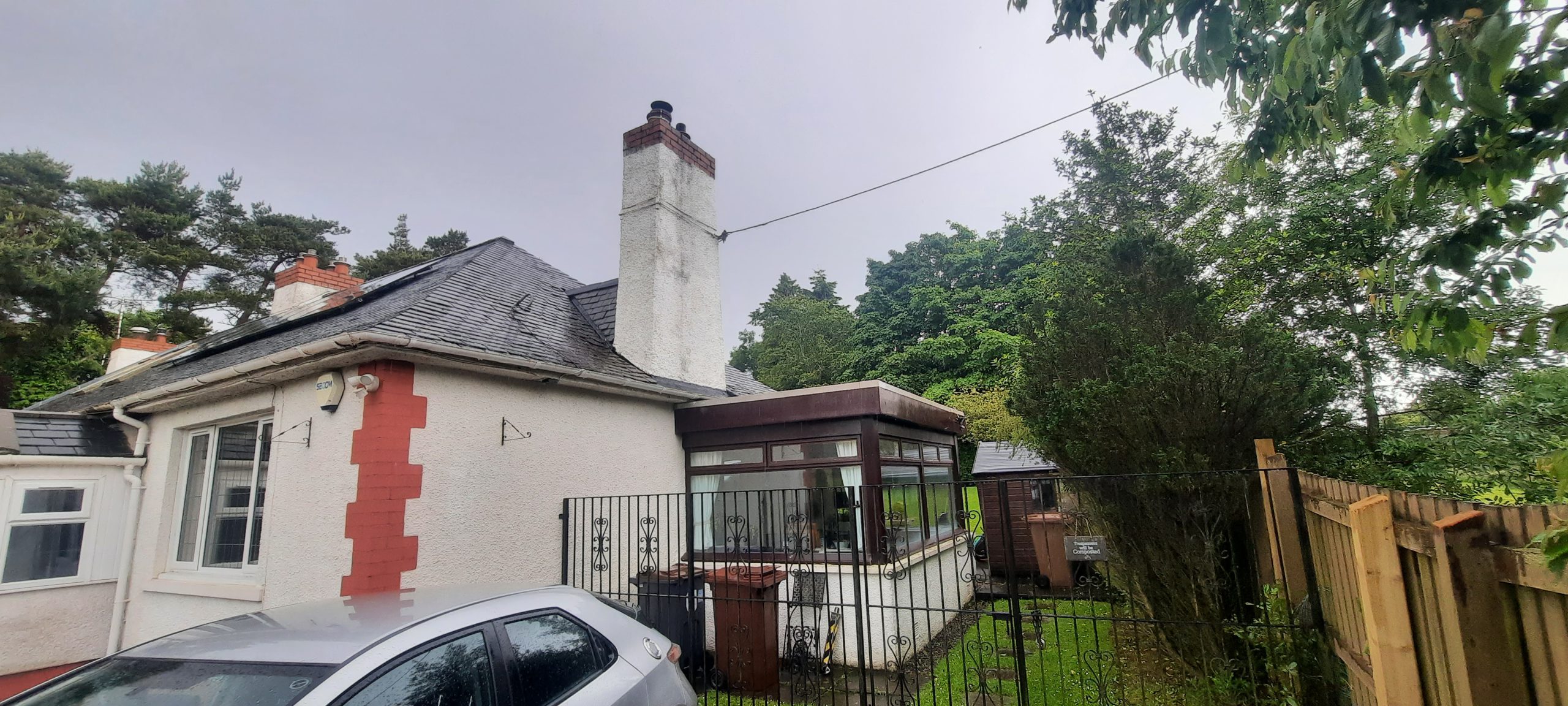 Rendering Edinburgh on upper chimney above conservatory