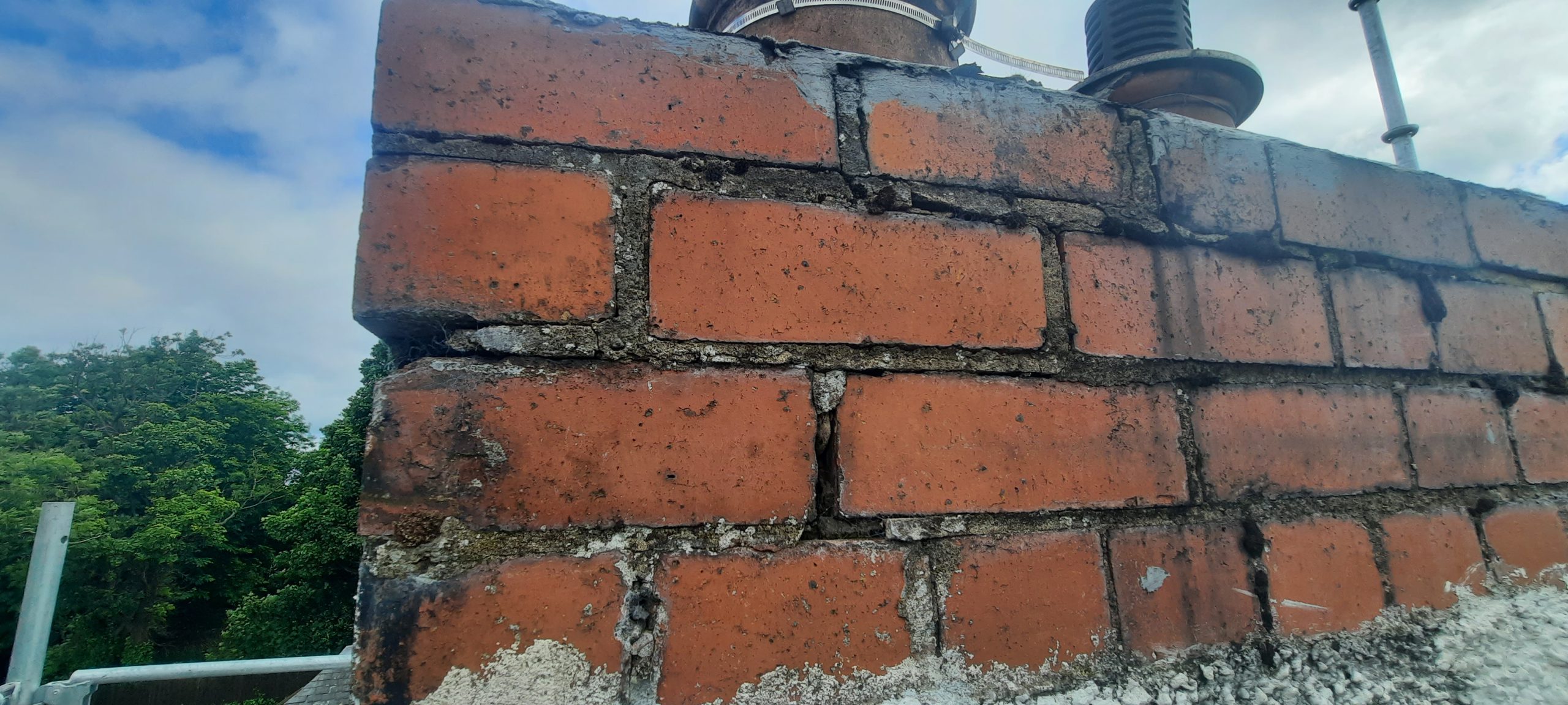 roughcast render repair blending into original brickwork