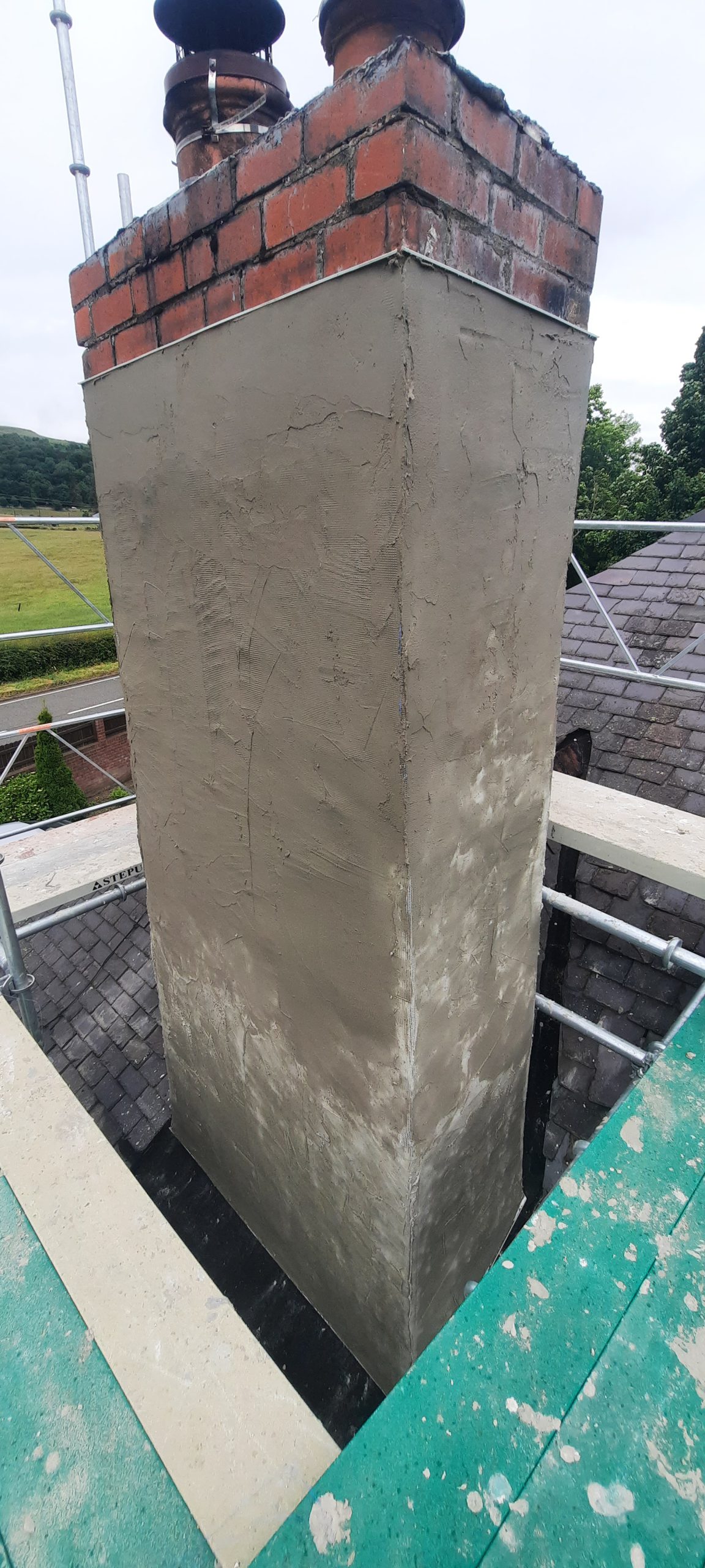 roughcaster Edinburgh smoothing fresh chimney render