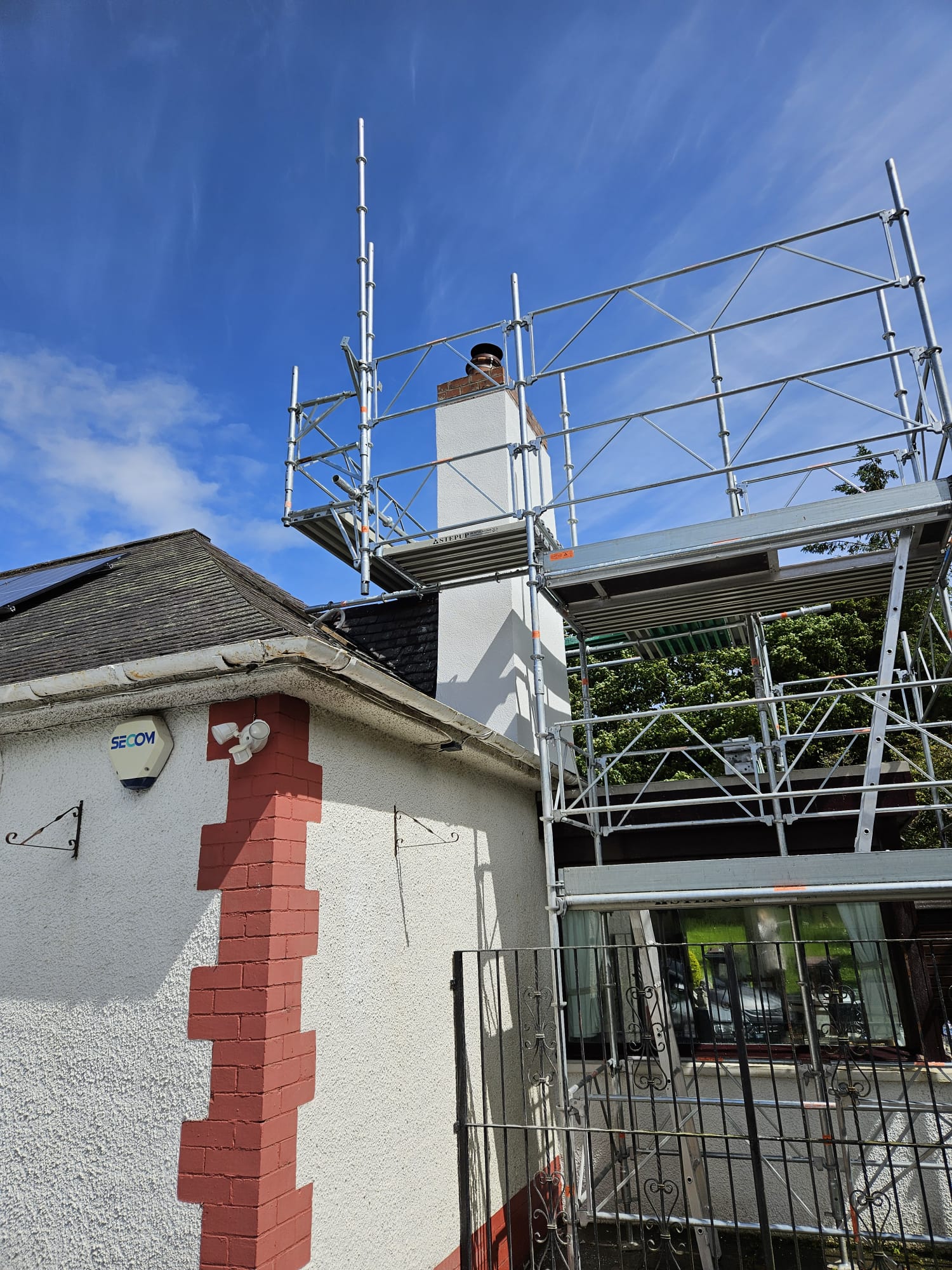house rendering Edinburgh during chimney restoration