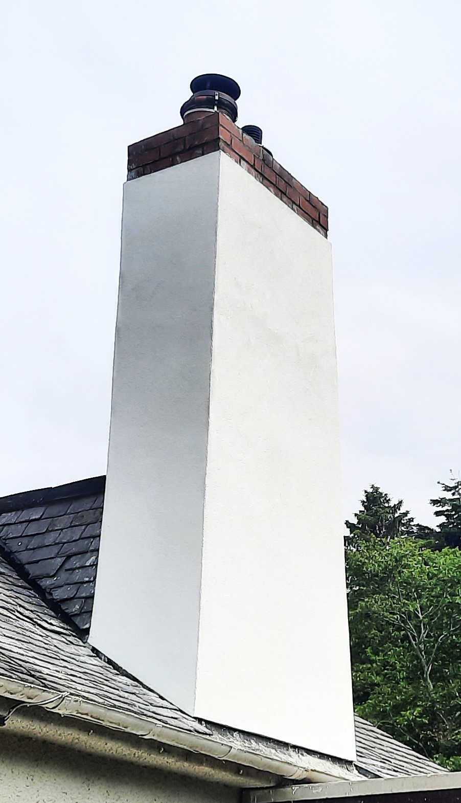 Rendering Edinburgh on upper chimney above roofline