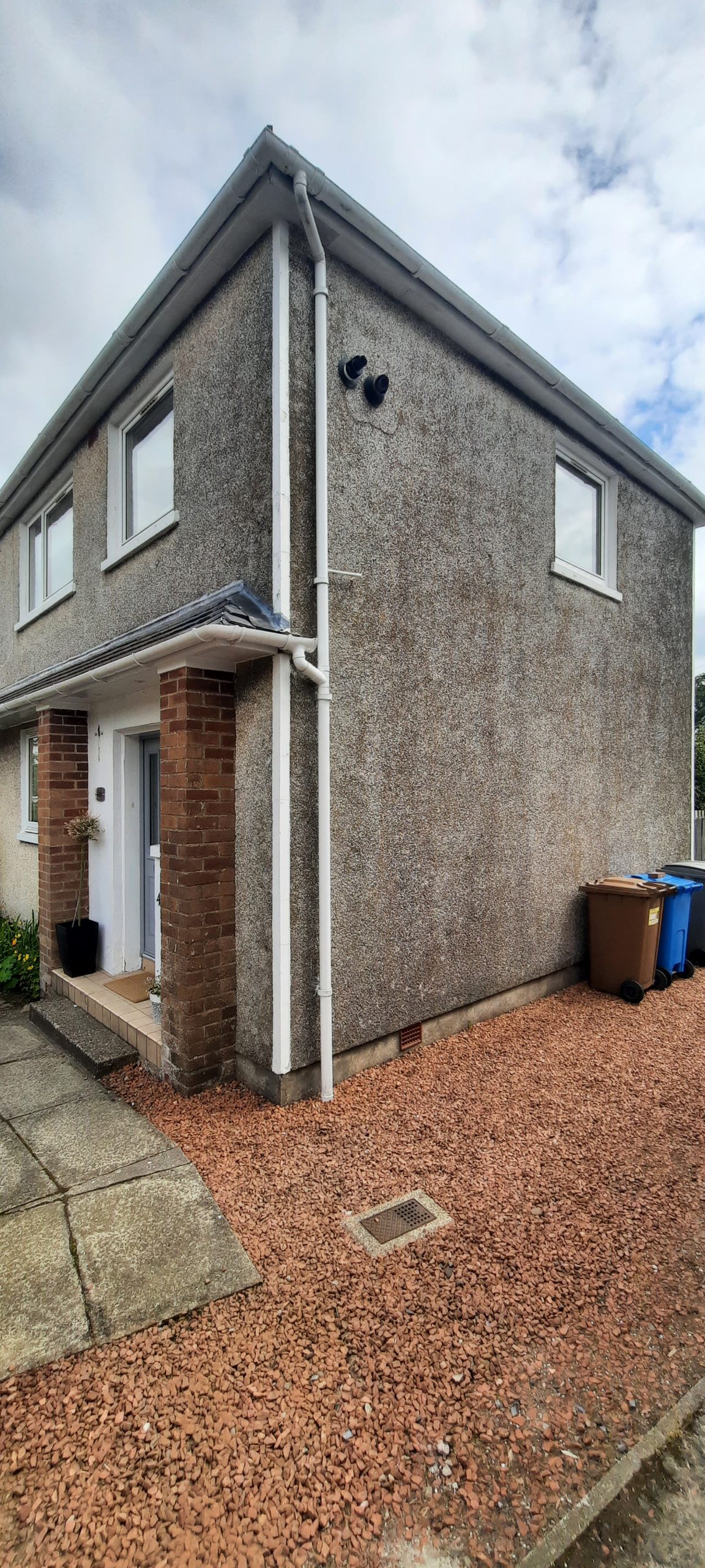 house rendering Edinburgh on side elevation with guttering