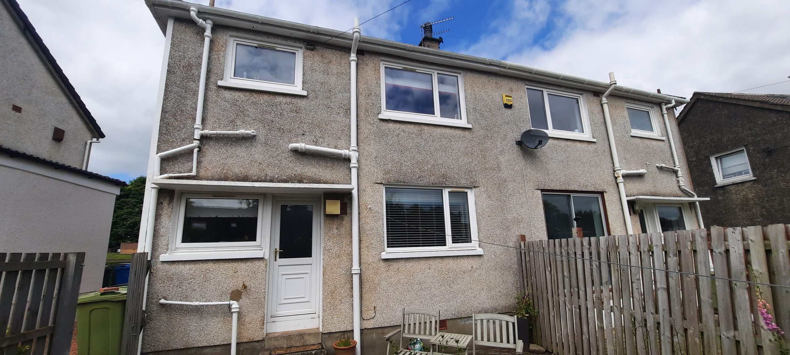 Rendering Edinburgh on weathered two-storey home