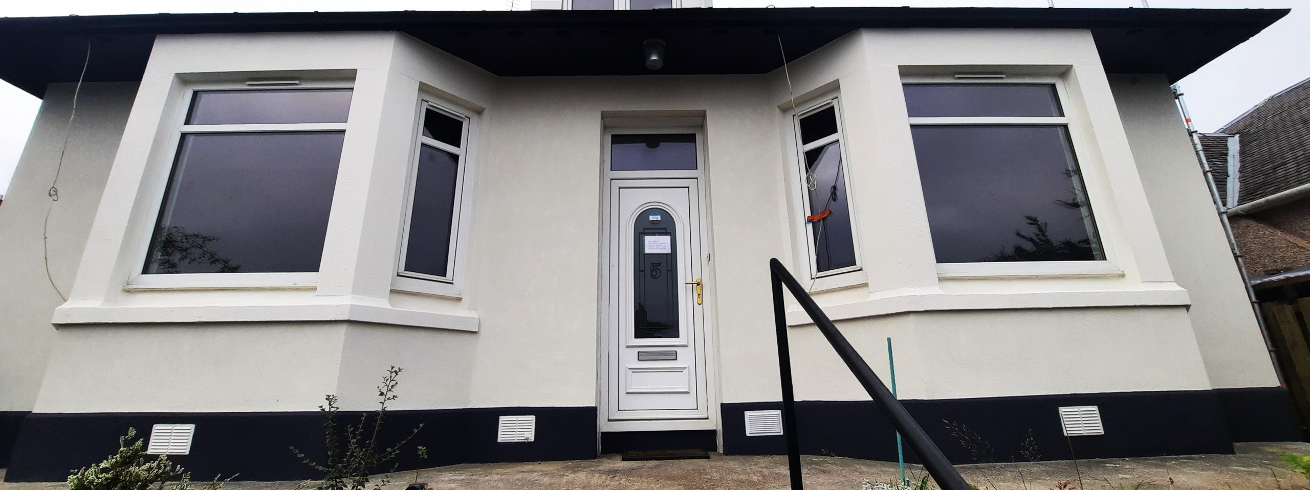 roughcast render Edinburgh around front door entrance