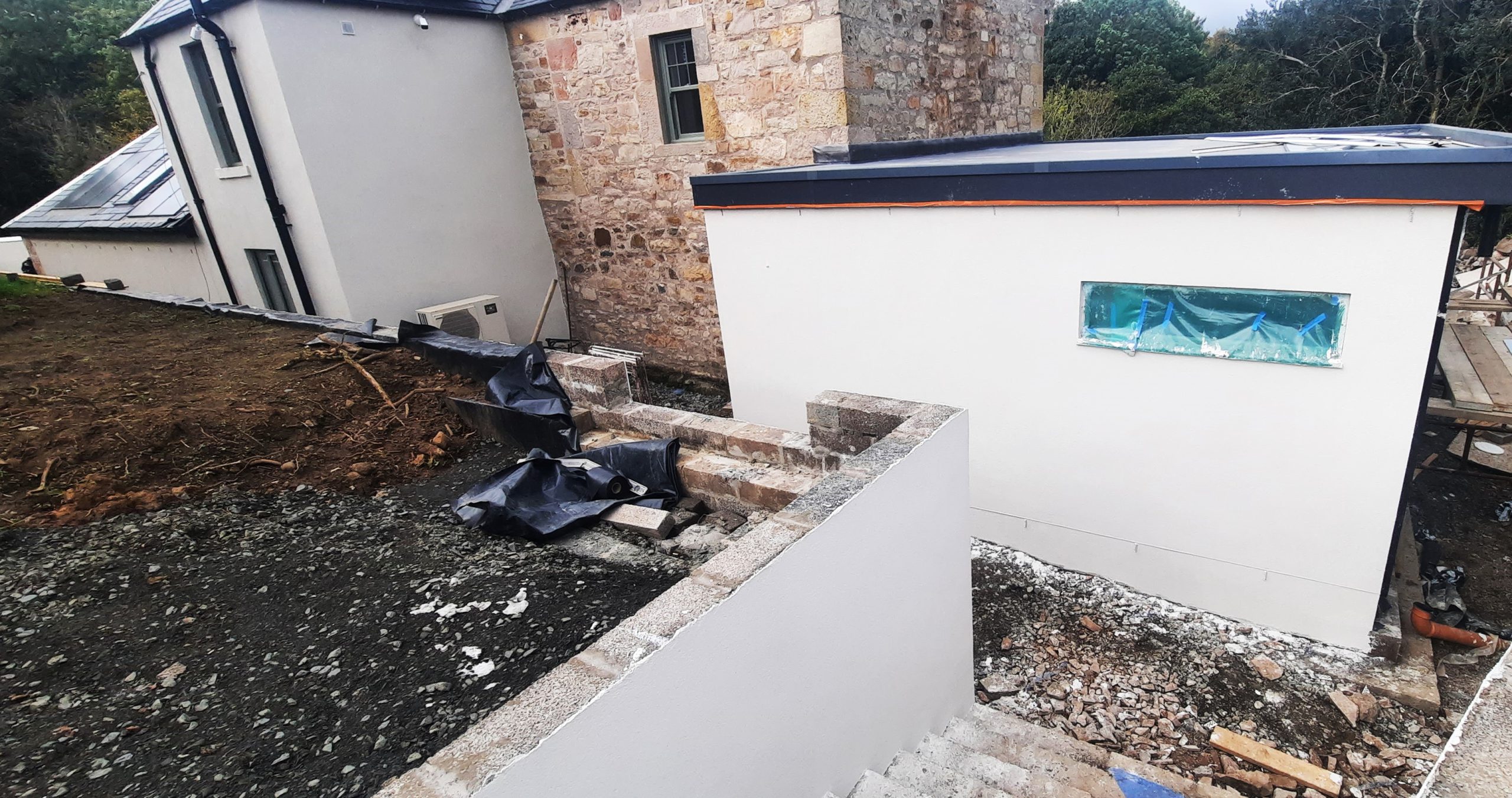 external wall insulation Edinburgh beside narrow walkway