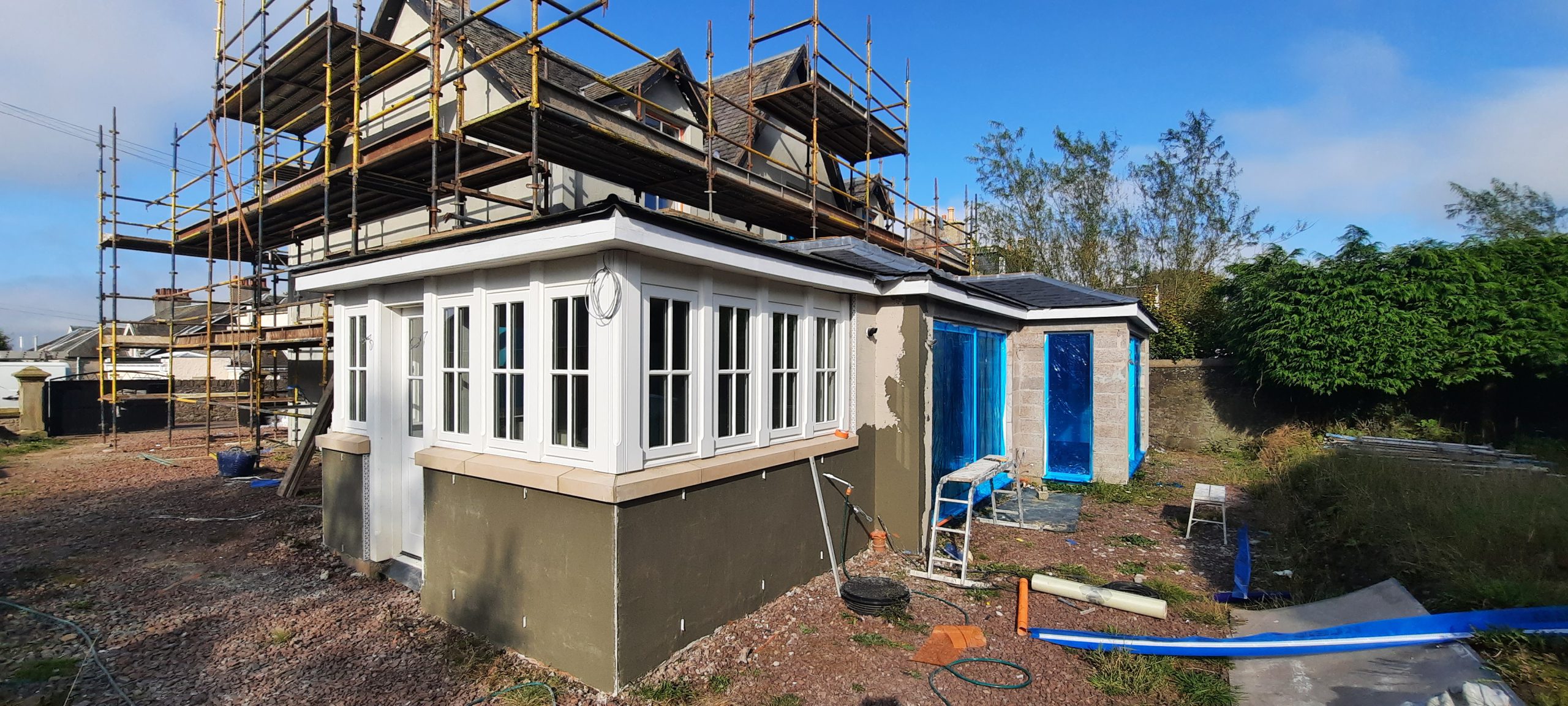 roughcast render Edinburgh on garden-facing extension
