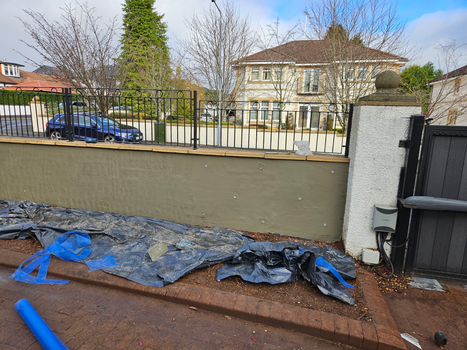 roughcaster Edinburgh repairing low boundary wall