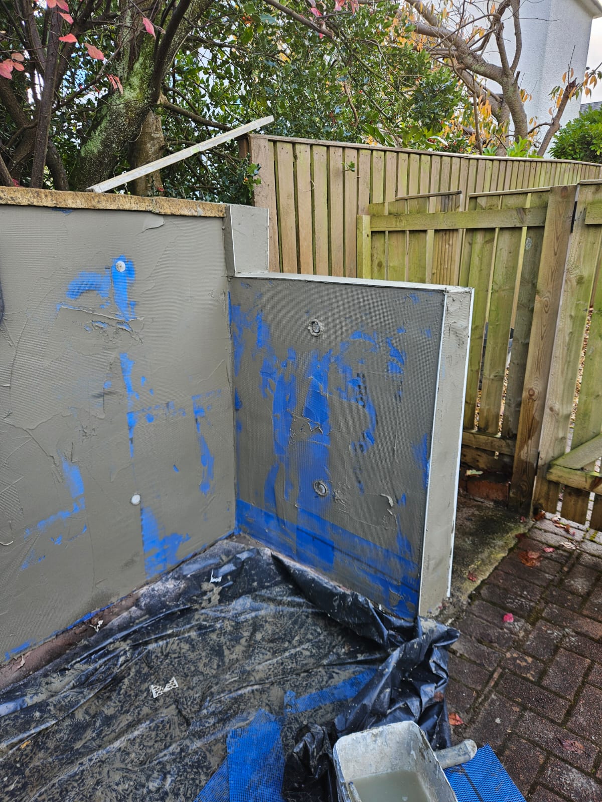 roughcasting Edinburgh applied to small wall panel