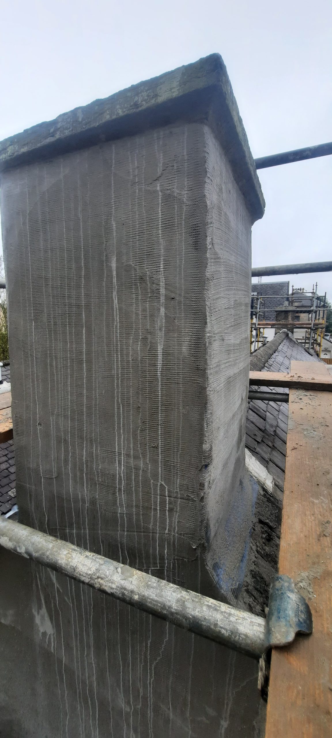 roughcast render Edinburgh applied to vertical pillar