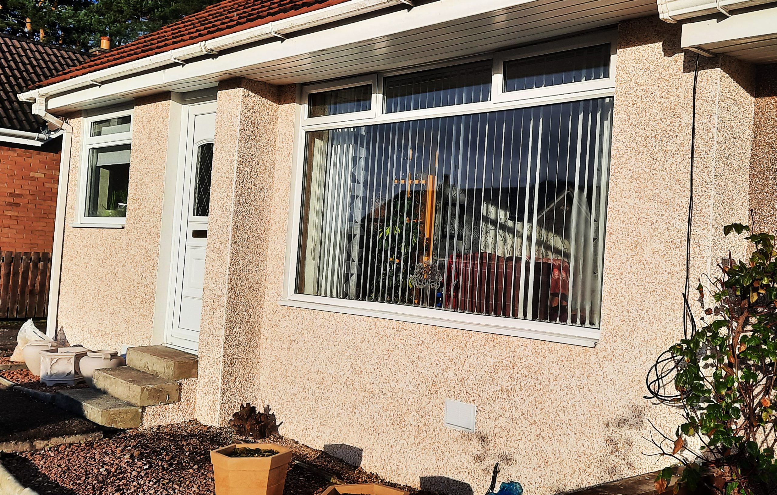 solid wall insulation Edinburgh on original roughcast wall