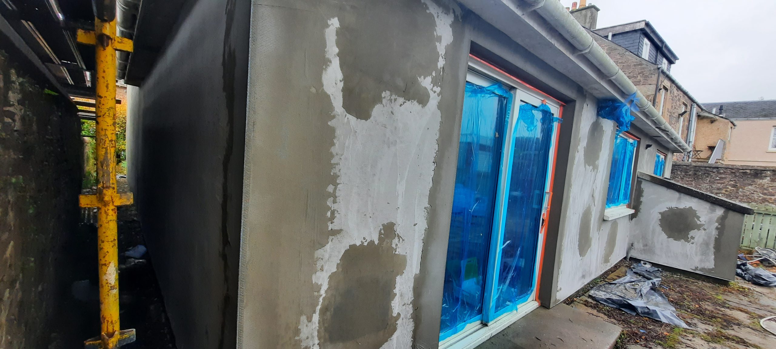 roughcasting Edinburgh patch repair near window frame