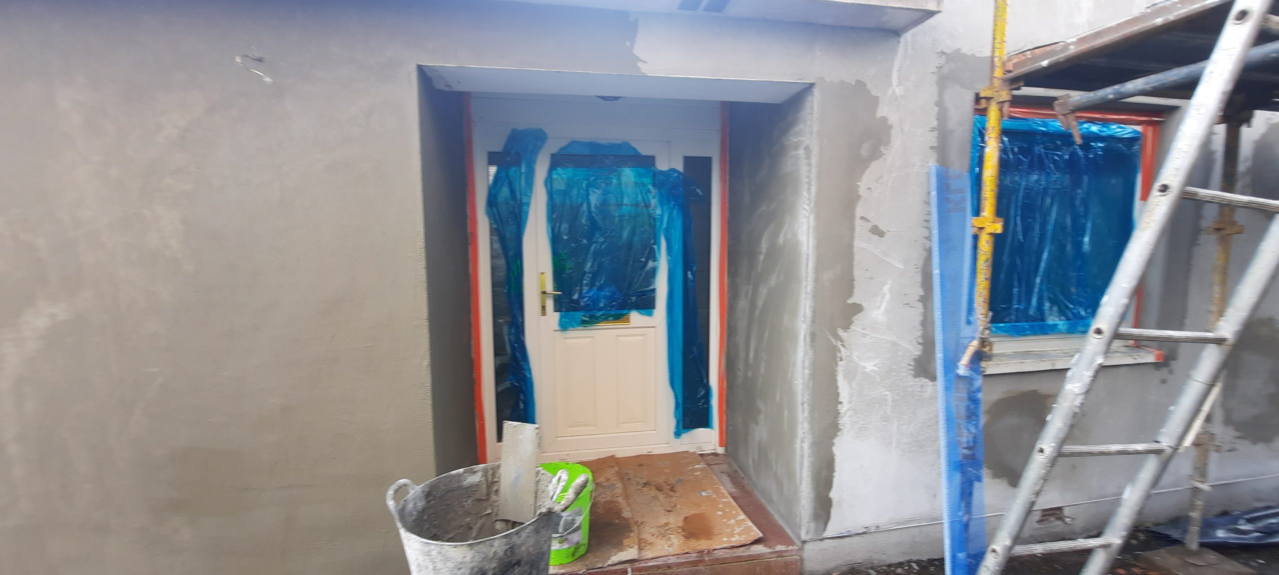 Insulation Edinburgh fitted beneath smooth façade