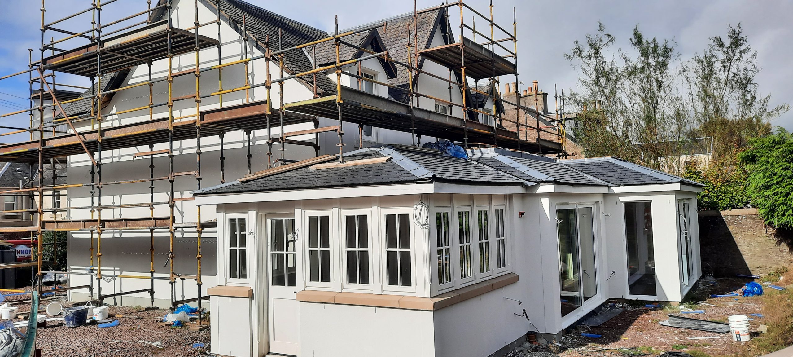 roughcast repair for multi-window garden extension