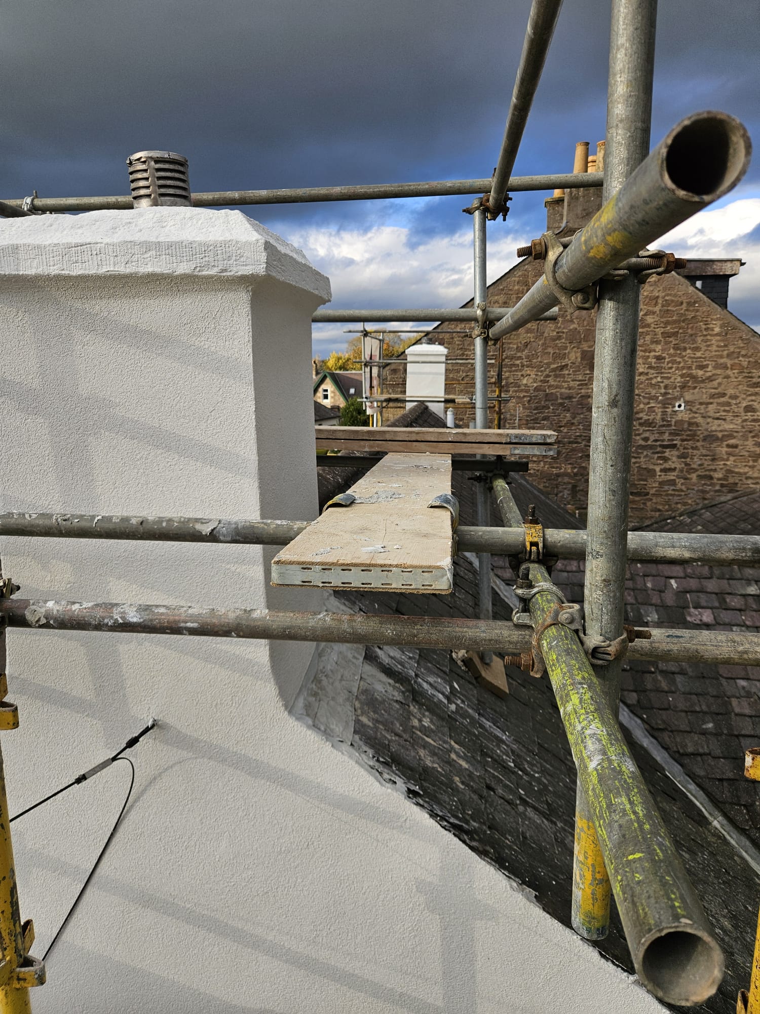 roughcast render Edinburgh applied beside scaffold