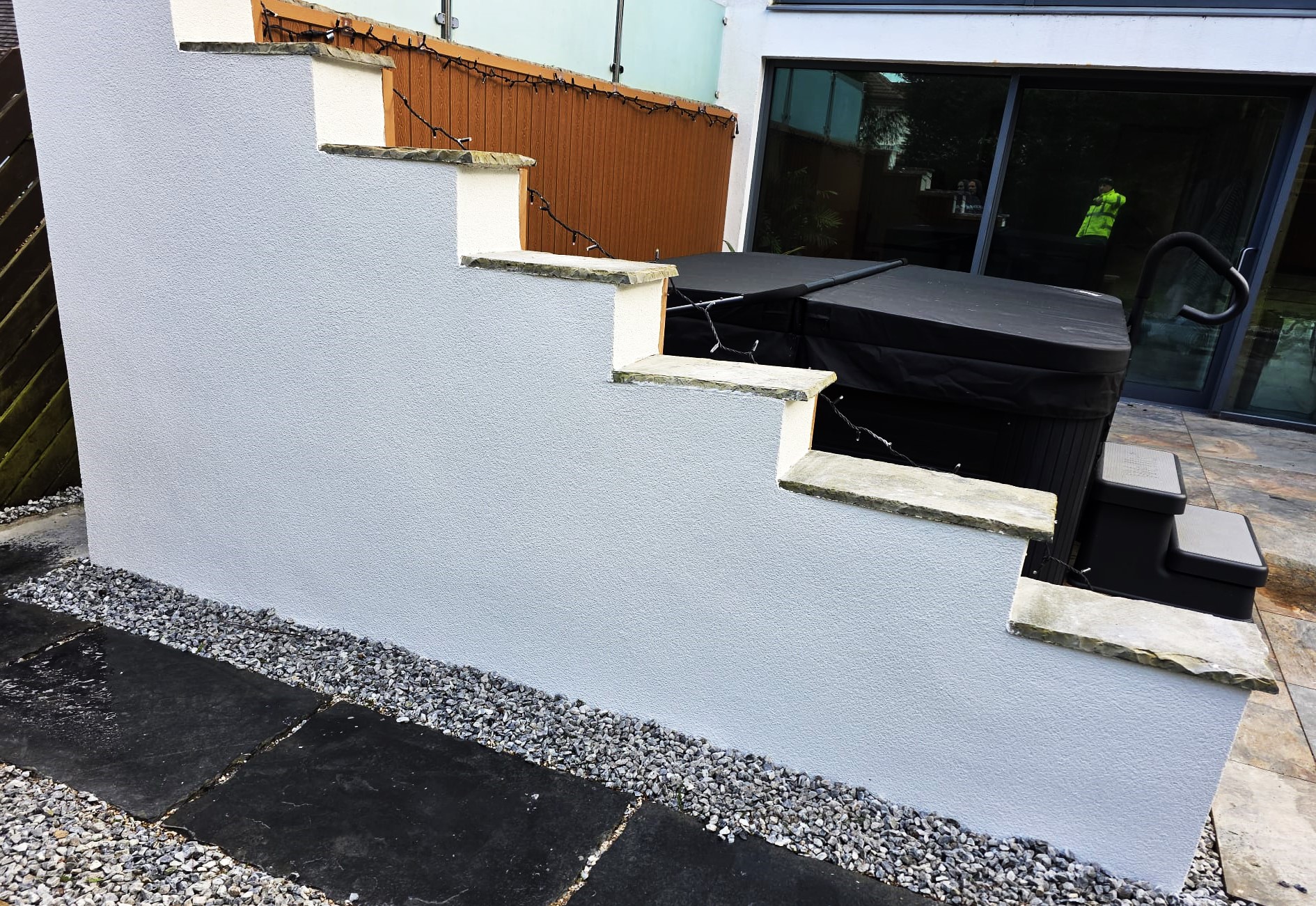 Rendering Edinburgh on stepped retaining wall