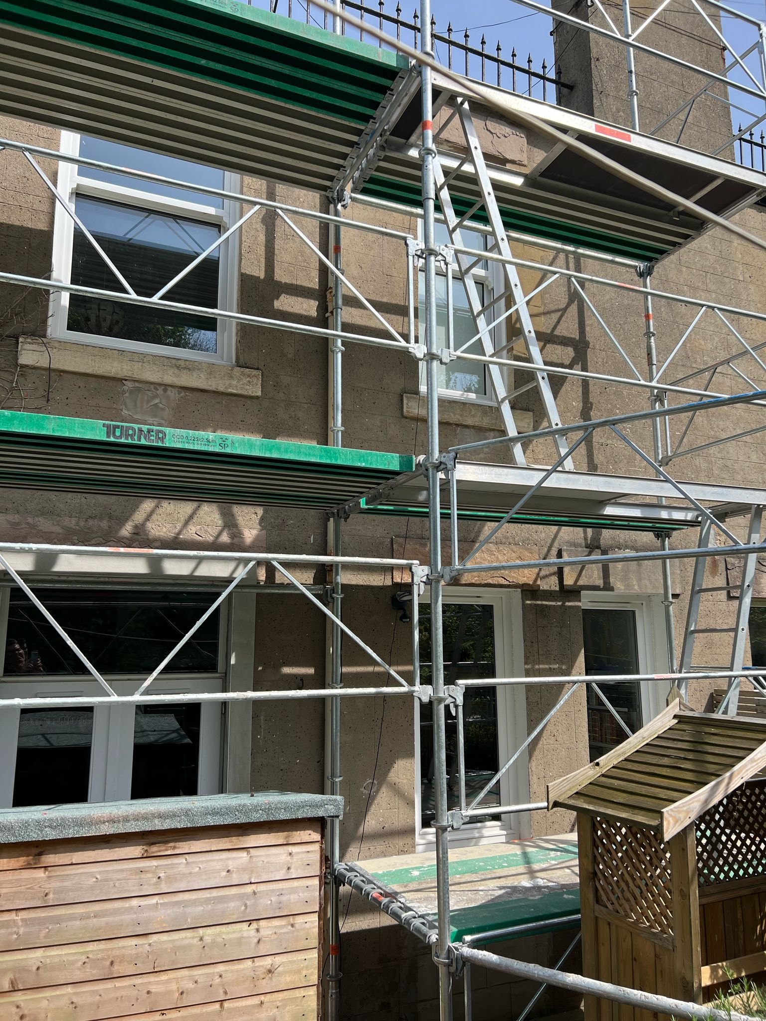 roughcasting Edinburgh renovation with scaffolding