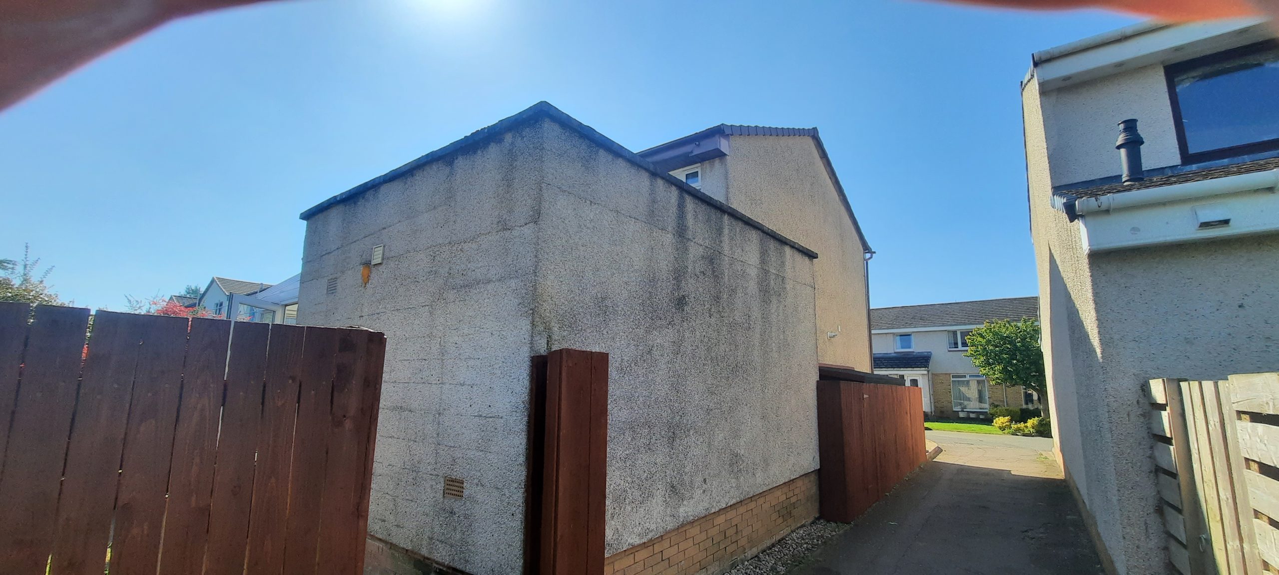 clean white roughcast render Edinburgh on property gable end