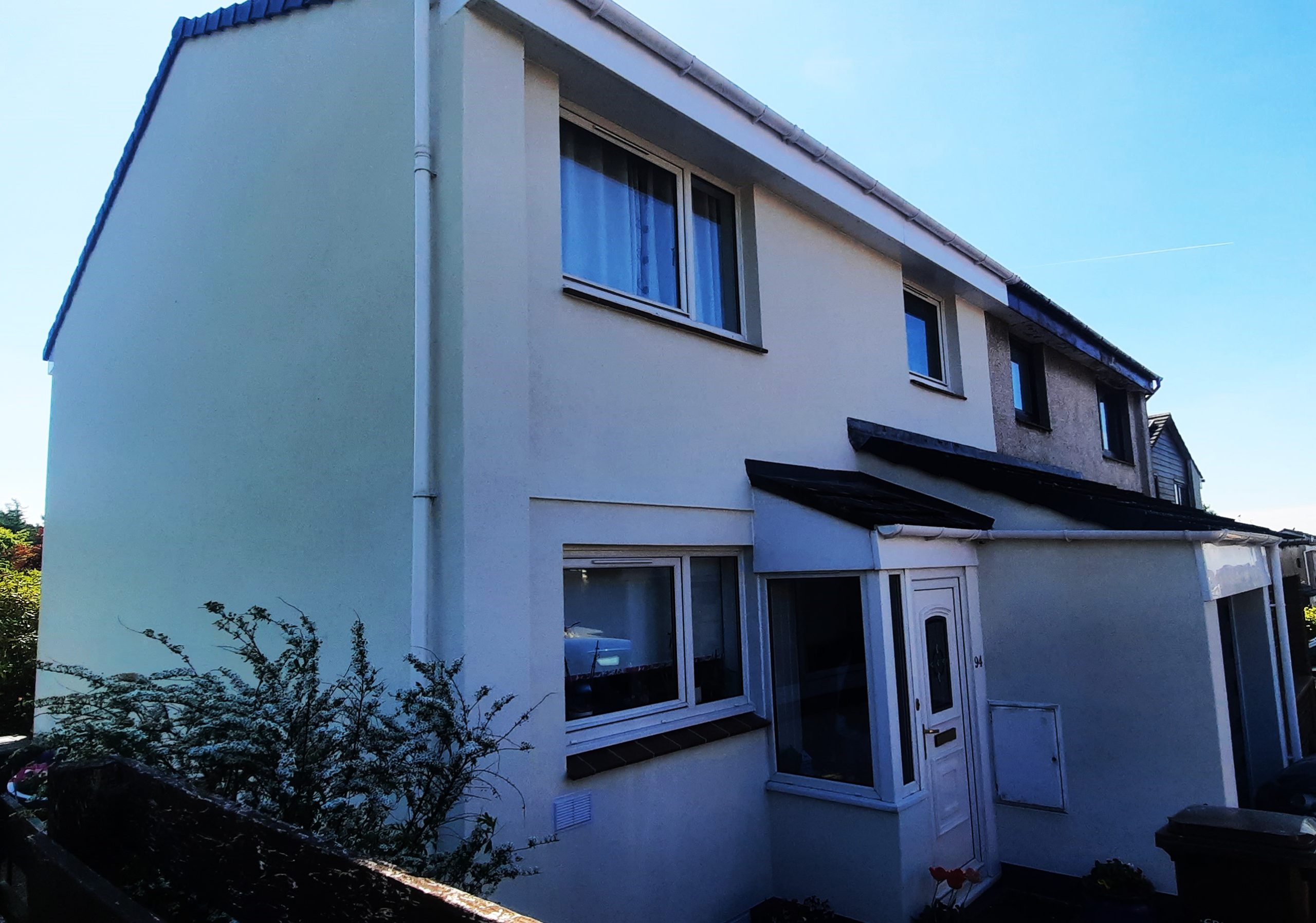 bright front of house showing newly applied roughcast render Edinburgh