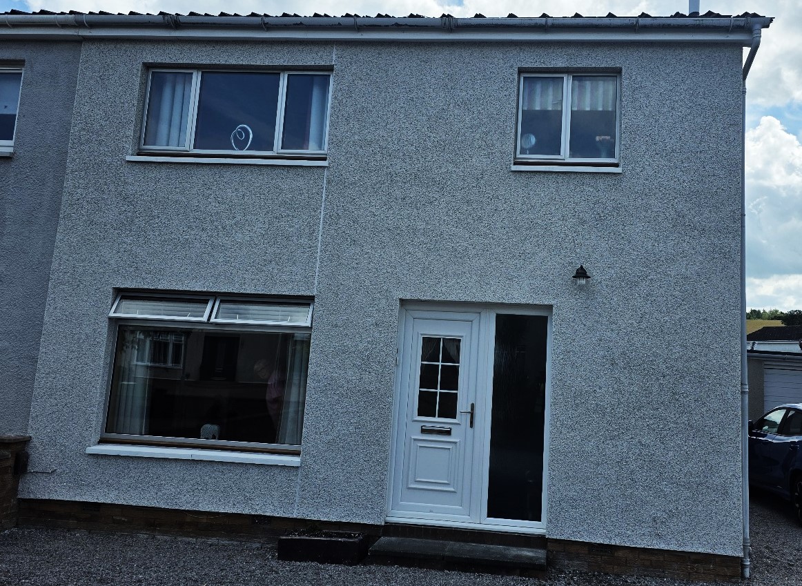 new entrance facade coated with roughcast render repair for even finish